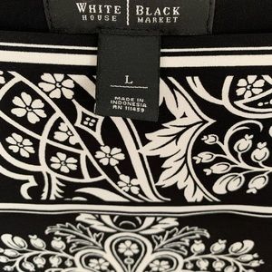 Black and white above the knee dress.